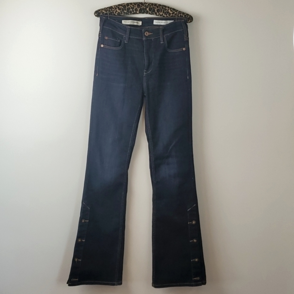 Flared Pilcro Jeans with Button Detail